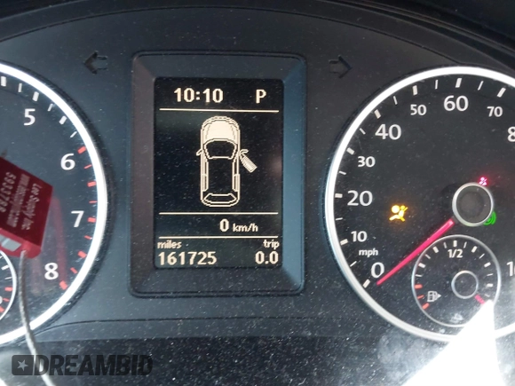 2012 Volkswagen Tiguan LE z VIN WVGAV7AX9CW096668, wystawiony jako IAAI lot #41664461 z przebiegiem 161 725 mil mil oraz . Historia ofert i sprzedaży dostępna na DreamBid. Obrazek 7.