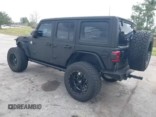 2018 Jeep Wrangler Unlimited Sport S z VIN 1C4HJXDG2JW228483, wystawiony jako IAAI lot #41710364 z przebiegiem 56 970 mil mil oraz . Historia ofert i sprzedaży dostępna na DreamBid. Obrazek 3.