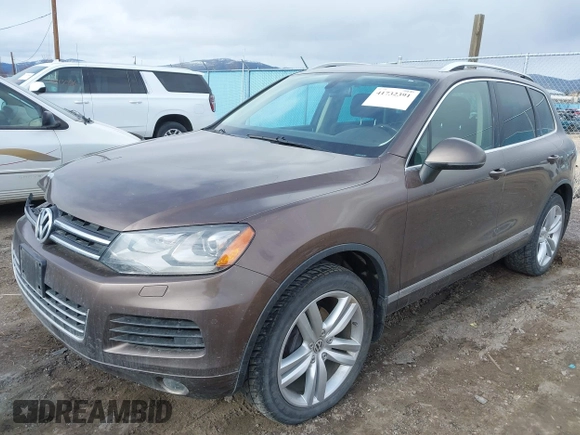 2013 Volkswagen Touareg Lux with VIN WVGEF9BP1DD012851, listed as a IAAI auction lot 41732391 with 123,283 mi miles and . Bid and sale history available at DreamBid. Image 18.