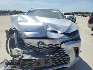 2024 Lexus RX with VIN JTJCHMAA9R2012022, listed as a Copart auction lot 67394304 with 15,733 mi miles and Salvage Title. Bid and sale history available at carsss.com. Image 5.
