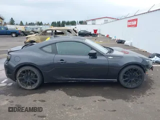 2015 Scion FR-S z VIN JF1ZNAA16F9710455, wystawiony jako IAAI lot #41838228 z przebiegiem 103 097 mil mil oraz . Historia ofert i sprzedaży dostępna na DreamBid. Obrazek 14.