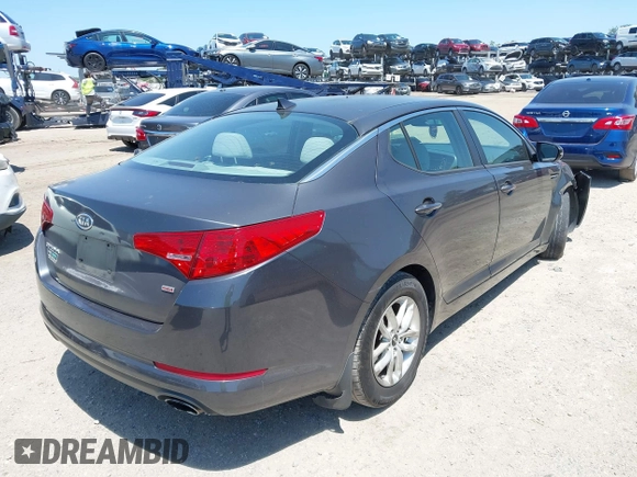 2011 Kia Optima LX with VIN KNAGM4A78B5185164, listed as a IAAI auction lot 41999846 with 216,008 mi miles and . Bid and sale history available at carsss.com. Image 4.