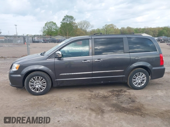 2015 Chrysler Town & Country Touring L with VIN 2C4RC1CG9FR646214, listed as a IAAI auction lot 42202486 with 184,555 mi miles and . Bid and sale history available at carsss.com. Image 14.