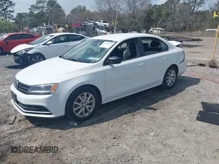 2015 Volkswagen Jetta Sedan 1.8T SE with VIN 3VWD17AJXFM249990, listed as a IAAI auction lot 41810073 with 127,683 mi miles. Bid and sale history available at carsss.com. Image 17.