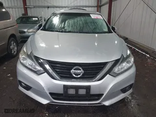 2018 Nissan Altima 2.5 SL with VIN 1N4AL3AP9JC177340, listed as a IAAI auction lot 41800890 with 120,439 mi miles. Bid and sale history available at carsss.com. Image 13.