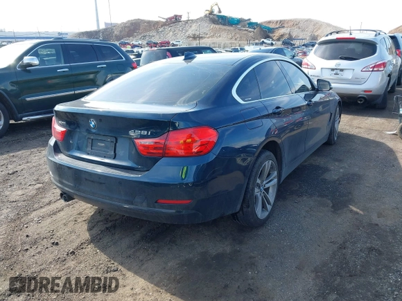 2016 BMW 4 Series 428i xDrive with VIN WBA4C9C56GG141089, listed as a IAAI auction lot 41587479 with 85,462 mi miles and . Bid and sale history available at DreamBid. Image 4.