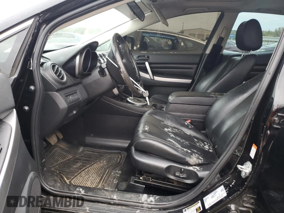 2010 Mazda CX-7 Touring z VIN JM3ER2W38A0311676, wystawiony jako Copart lot #79126164 z przebiegiem 203 934 mil mil oraz Szkoda całkowita • Salvage title. Historia ofert i sprzedaży dostępna na DreamBid. Obrazek 7.