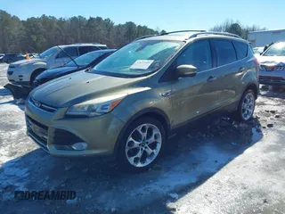 2013 Ford Escape Titanium with VIN 1FMCU9J99DUD46870, listed as a IAAI auction lot 41614409 with 141,739 mi miles and . Bid and sale history available at DreamBid. Image 2.