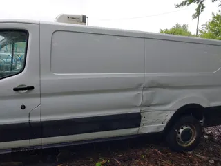 2019 Ford Transit with VIN 1FTYR2ZG0KKA10216, listed as a IAAI auction lot 42178300 with 187,096 mi miles and . Bid and sale history available at DreamBid. Image 14.