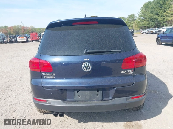 2014 Volkswagen Tiguan S z VIN WVGBV3AX7EW545538, wystawiony jako IAAI lot #42083281 z przebiegiem 129 227 mil mil oraz . Historia ofert i sprzedaży dostępna na DreamBid. Obrazek 16.