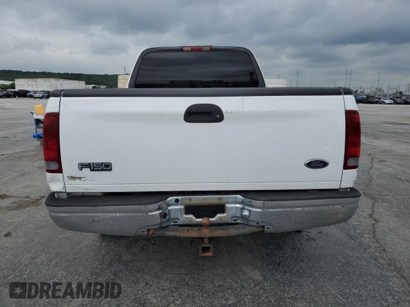 2002 Ford F-150 XL z VIN 1FTRX17W42NC08021, wystawiony jako Copart lot #54981215 z przebiegiem 109 078 mil mil oraz Czysty tytuł • Clean title. Historia ofert i sprzedaży dostępna na DreamBid. Obrazek 6.