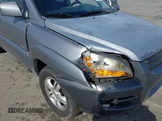 2005 Kia Sportage LX with VIN KNDJE723757102304, listed as a IAAI auction lot 41689073 with 125,276 mi miles and . Bid and sale history available at carsss.com. Image 6.