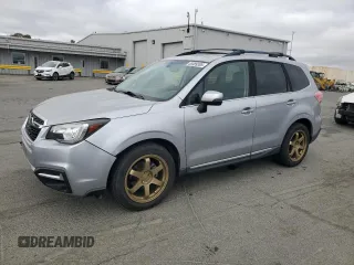2018 Subaru Forester Touring z VIN JF2SJAWC5JH552787, wystawiony jako Copart lot #65989305 z przebiegiem 62 318 mil mil oraz Szkoda całkowita • Salvage title. Historia ofert i sprzedaży dostępna na DreamBid. Obrazek 1.