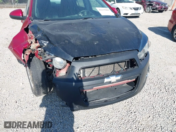 2013 Chevrolet Sonic LT with VIN 1G1JC5SH3D4256507, listed as a IAAI auction lot 42235009 with 117,804 mi miles and . Bid and sale history available at DreamBid. Image 6.