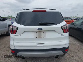 2017 Ford Escape SE with VIN 1FMCU0GD0HUD19621, listed as a IAAI auction lot 42123026 with 105,664 mi miles and . Bid and sale history available at carsss.com. Image 16.