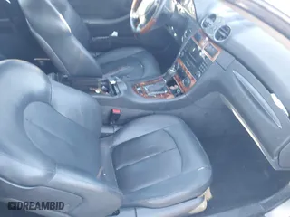 2005 Mercedes-Benz CLK-Class 5.0L with VIN WDBTK75J85F126398, listed as a IAAI auction lot 41890954 with 124,554 mi miles. Bid and sale history available at carsss.com. Image 5.