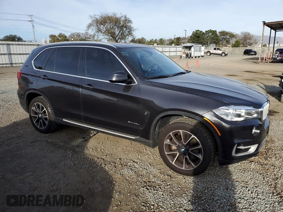 2018 BMW X5 xDrive40e iPerformance with VIN 5UXKT0C51J0W03594, listed as a Copart auction lot 47802005 with 59,670 mi miles and Salvage Title. Bid and sale history available at carsss.com. Image 4.