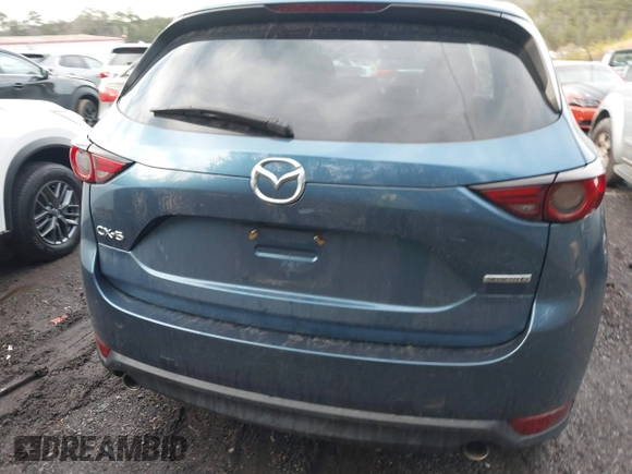 2020 Mazda CX-5 Grand Touring with VIN JM3KFADM4L0827733, listed as a IAAI auction lot 41482517 with 43,597 mi miles. Bid and sale history available at carsss.com. Image 16.