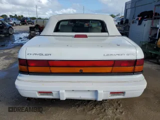 1995 Chrysler LeBaron z VIN 1C3EU4531SF671668, wystawiony jako Copart lot #74679224 z przebiegiem 77 023 mil mil oraz Nie do naprawy. Historia ofert i sprzedaży dostępna na DreamBid. Obrazek 6.