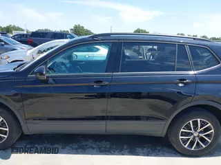 2021 Volkswagen Tiguan S with VIN 3VV1B7AX9MM067347, listed as a IAAI auction lot 42305101 with 77,042 mi miles and . Bid and sale history available at DreamBid. Image 14.