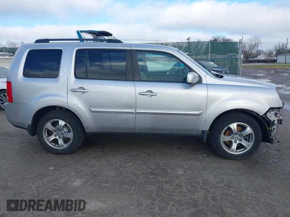 2013 Honda Pilot EX-L with VIN 5FNYF3H76DB013332, listed as a IAAI auction lot 41193240 with 121,308 mi miles and . Bid and sale history available at DreamBid. Image 14.