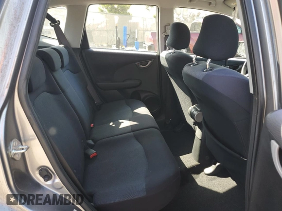 2009 Honda Fit Sport with VIN JHMGE88429S035189, listed as a Copart auction lot 53992725 with 87,030 mi miles and Salvage Title. Bid and sale history available at carsss.com. Image 10.