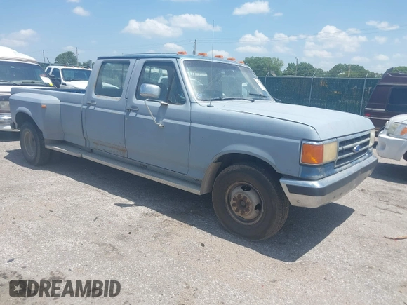 1991 Ford F-350 z VIN 2FTJW35M6MCA03659, wystawiony jako IAAI lot #42583030 z przebiegiem 31 526 mil mil oraz . Historia ofert i sprzedaży dostępna na DreamBid. Obrazek 1.