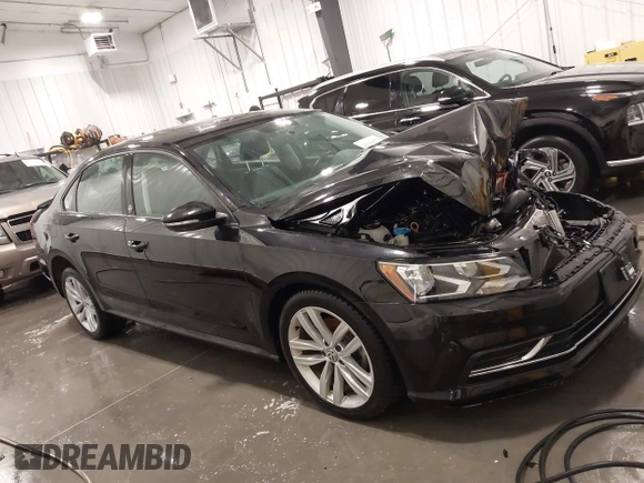 2019 Volkswagen Passat Wolfsburg Edition z VIN 1VWLA7A36KC004077, wystawiony jako IAAI lot #42164379 z przebiegiem 50 498 mil mil oraz . Historia ofert i sprzedaży dostępna na DreamBid. Obrazek 14.