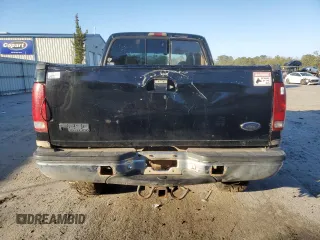 1999 Ford Super Duty F-250 XL with VIN 1FTNW21S4XEE54748, listed as a Copart auction lot 41395325 with 298,200 mi miles and Salvage Title. Bid and sale history available at carsss.com. Image 6.