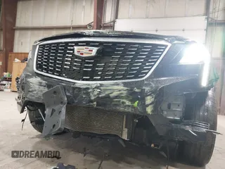 2022 Cadillac XT5 AWD Premium Luxury with VIN 1GYKNDRS8NZ163725, listed as a IAAI auction lot 42295528 with 45,614 mi miles and . Bid and sale history available at DreamBid. Image 17.