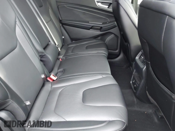 2021 Ford Edge Titanium z VIN 2FMPK4K94MBA32297, wystawiony jako IAAI lot #41834740 z przebiegiem 45 908 mil mil oraz . Historia ofert i sprzedaży dostępna na DreamBid. Obrazek 8.
