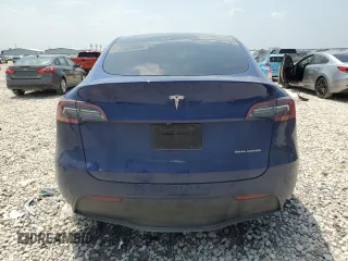 2024 Tesla Model Y Long Range with VIN 7SAYGAEE6RF196245, listed as a Copart auction lot 54667765 with 10,336 mi miles and Salvage title. Bid and sale history available at DreamBid. Image 6.