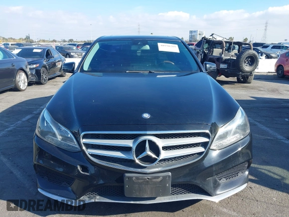2014 Mercedes-Benz E-Class E 250 BlueTEC Luxury with VIN WDDHF0EB9EA912094, listed as a IAAI auction lot 41329405 with 122,503 mi miles. Bid and sale history available at carsss.com. Image 6.
