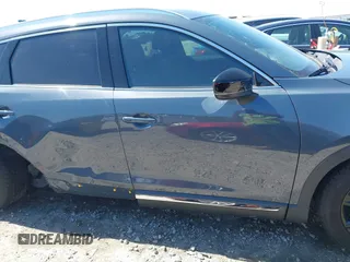 2021 Mazda CX-9 Carbon Edition with VIN JM3TCADY9M0517174, listed as a IAAI auction lot 41871485 with 48,484 mi miles and . Bid and sale history available at DreamBid. Image 14.