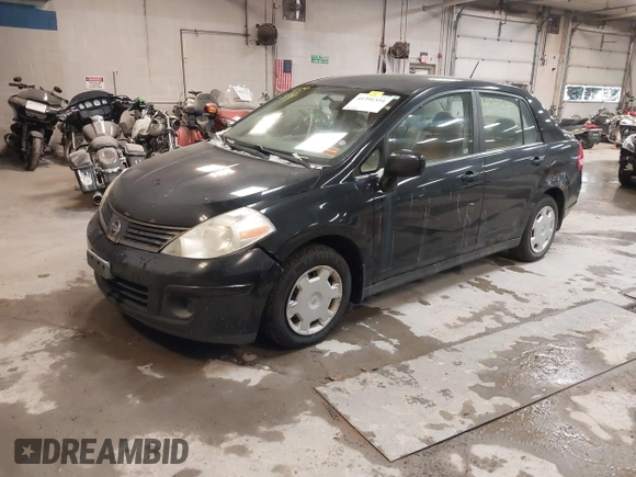 2007 Nissan Versa 1.8 SL with VIN 3N1BC11E47L411983, listed as a IAAI auction lot 41391334 with 201,830 mi miles. Bid and sale history available at carsss.com. Image 2.
