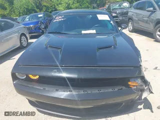 2023 Dodge Challenger SXT with VIN 2C3CDZAG3PH586933, listed as a IAAI auction lot 42001266 with 38,097 mi miles. Bid and sale history available at carsss.com. Image 12.