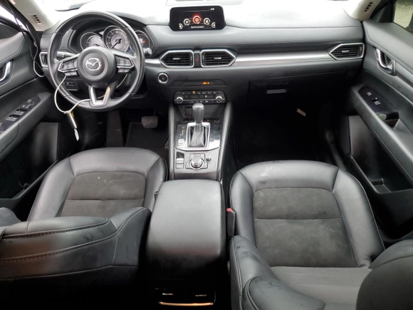 2020 Mazda CX-5 Touring with VIN JM3KFBCM1L0792706, listed as a Copart auction lot 73032144 with 56,845 mi miles and Salvage Title. Bid and sale history available at carsss.com. Image 8.