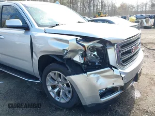 2015 GMC Yukon SLE with VIN 1GKS1AKC8FR540627, listed as a IAAI auction lot 42004023 with 128,195 mi miles. Bid and sale history available at carsss.com. Image 6.