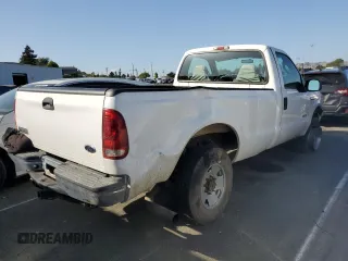 2005 Ford F-250 XL with VIN 1FTSF21P75EC11799, listed as a Copart auction lot 55653454 with 162,576 mi miles and Salvage Title. Bid and sale history available at DreamBid. Image 3.
