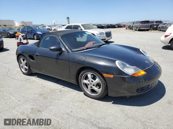 2000 Porsche Boxster с VIN WP0CA2983YU620909, выставлен на аукционе Copart как лот 58087035 с пробегом 99 845 миль миль и Чистый • Clean title. История ставок и продаж доступна на DreamBid. Изображение 4.