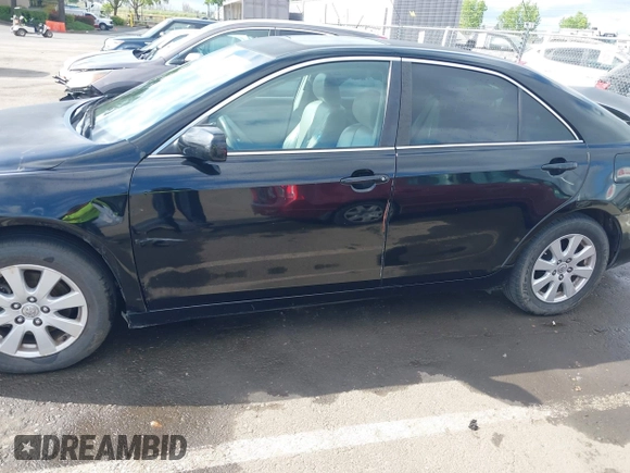 2007 Toyota Camry LE with VIN JTNBK46K173003755, listed as a IAAI auction lot 42125549 with 141,766 mi miles and . Bid and sale history available at DreamBid. Image 17.