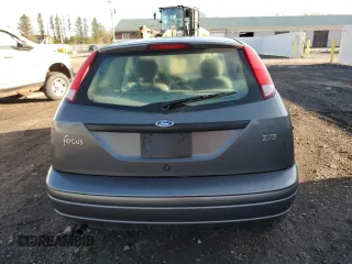 2004 Ford Focus z VIN 3FAFP31Z24R125730, wystawiony jako Copart lot #55257835 z przebiegiem 100 813 mil mil oraz Szkody całkowita. Historia ofert i sprzedaży dostępna na DreamBid. Obrazek 6.
