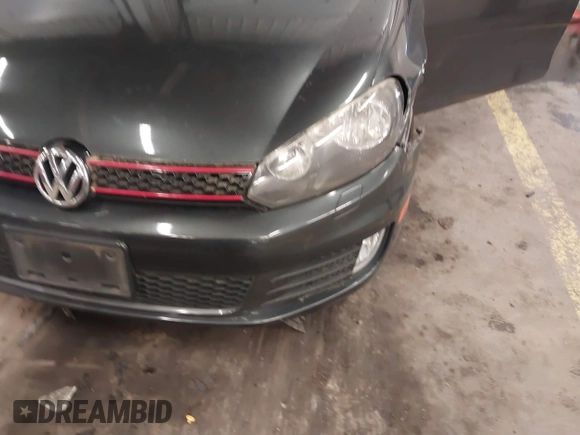 2012 Volkswagen GTI w/Sunroof & Navi PZEV with VIN WVWGD7AJ2CW100248, listed as a IAAI auction lot 41905190 with 106,489 mi miles and . Bid and sale history available at DreamBid. Image 6.