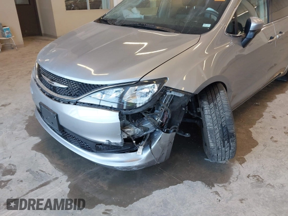 2021 Chrysler Voyager LXi with VIN 2C4RC1DG2MR506453, listed as a IAAI auction lot 41770938 with 90,255 mi miles and . Bid and sale history available at DreamBid. Image 6.