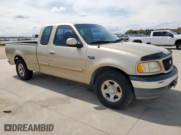 2000 Ford F-150 XL with VIN 1FTZX1729YKB42816, listed as a Copart auction lot 50132615 with 278,231 mi miles and Clean title. Bid and sale history available at DreamBid. Image 4.