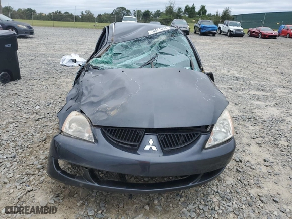 2004 Mitsubishi Lancer ES with VIN JA3AJ26EX4U043127, listed as a Copart auction lot 70471054 with 246,738 mi miles and Salvage Title. Bid and sale history available at carsss.com. Image 5.