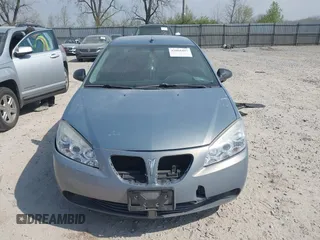 2008 Pontiac G6 1SV Value Leader z VIN 1G2ZF57B184178440, wystawiony jako IAAI lot #42068407 z przebiegiem 211 306 mil mil oraz . Historia ofert i sprzedaży dostępna na DreamBid. Obrazek 12.