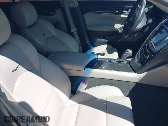 2015 Cadillac CTS with VIN 1G6AP5SX7F0139285, listed as a IAAI auction lot 41999355 with 34,709 mi miles and . Bid and sale history available at DreamBid. Image 5.
