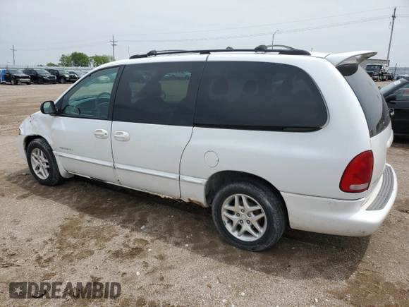 2000 Dodge Caravan SE with VIN 1B4GP44G7YB636078, listed as a Copart auction lot 59387395 with 184,916 mi miles and Salvage title. Bid and sale history available at DreamBid. Image 2.