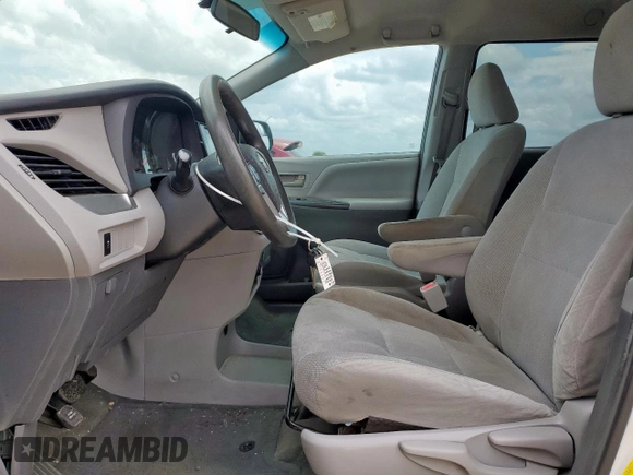 2015 Toyota Sienna L with VIN 5TDZK3DC4FS641312, listed as a Copart auction lot 63699245 with Not provided miles and Salvage title. Bid and sale history available at DreamBid. Image 7.